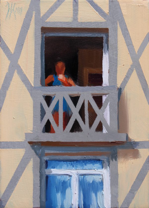 Balkon met rokende vrouw