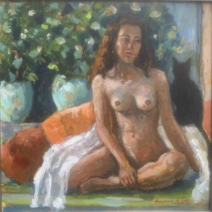 Meisje met de oranje kussens